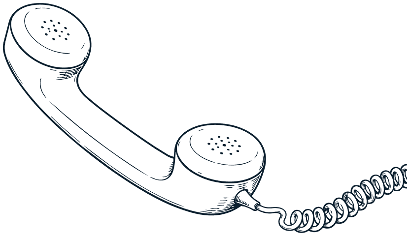 An old telephone handset on its coiled cord